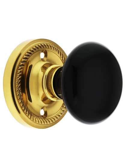 Rope Rose with Black Porcelain Knob in Polished Brass with .